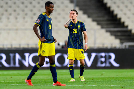 Alexander Isak and Kristoffer Olsson of Sweden looks