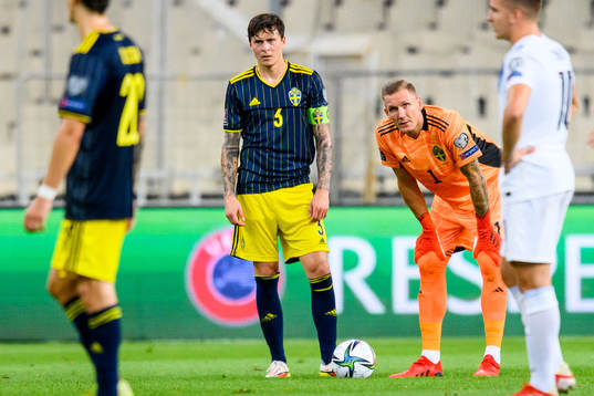 Victor Nilsson Lindelöf and goalkeeper Robin Olsen of