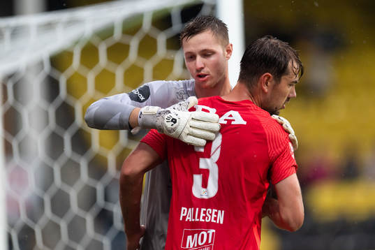Goalkeeper Lennart Grill and Fredrik Pallesen Knudsen of