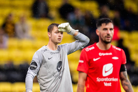 Goalkeeper Lennart Grill and Daniel Alexander Pedersen of