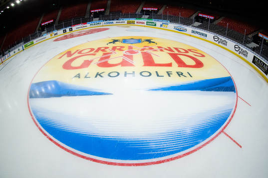 En tekningscirkel med Norrlands Gulds logo