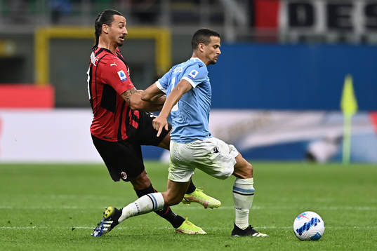 Zlatan Ibrahimovic of Milan and Adam Marusic of Lazio