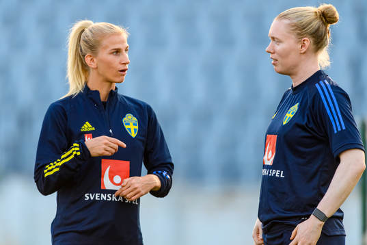Sofia Jakobsson and goalkeeper Hedvig Lindahl of the