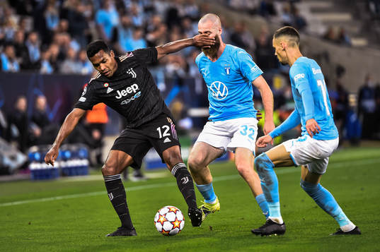 Alex Sandro of Juventus against Jo Inge Berget and Veljko