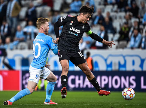 Anders Christiansen of Malmö FF and Paulo Dybala of