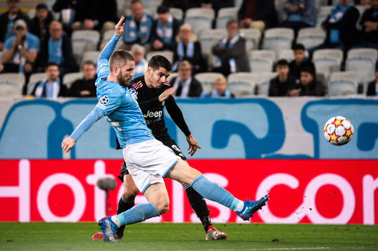 Jo Inge Berget of Malmö FF and Alvaro Morata of Juventus