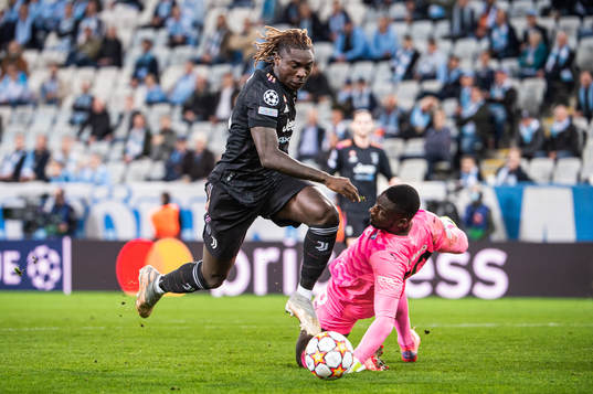 Moise Kean of Juventus score the 0-4 goal behind goalkeeper
