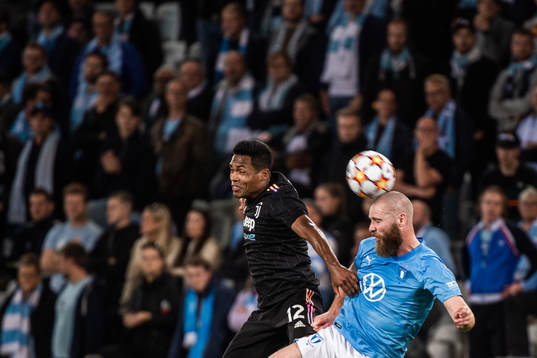 Alex Sandro of Juventus and Jo Inge Berget of Malmö FF
