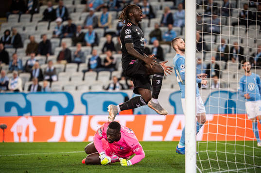 Moise Kean of Juventus and goalkeeper Ismael Diawara of