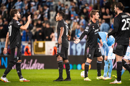 Alex Sandro of Juventus celebrate with teammates