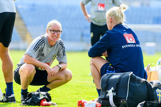 Victoria Sandell, assistant coach and Caroline Seger of the