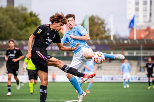 Felix Nzouango of Juventus and August Karlin of Malmö FF