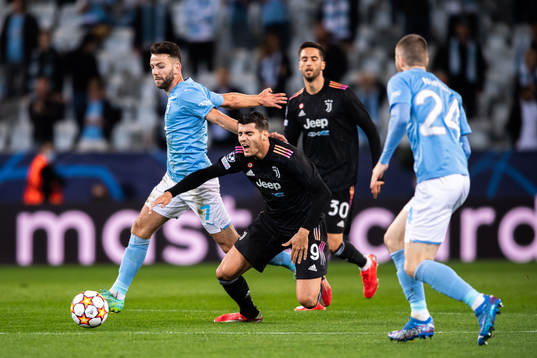 Erdal Rakip of Malmö FF and Alvaro Morata of Juventus