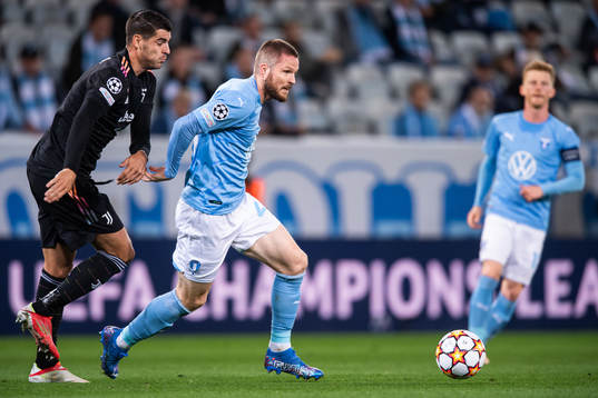 Alvaro Morata of Juventus and Lasse Nielsen of Malmö FF