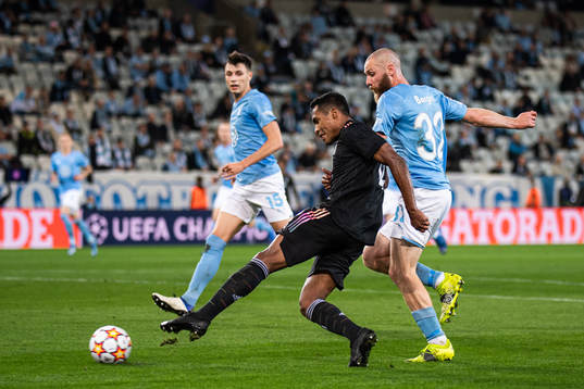 Alex Sandro of Juventus and Jo Inge Berget of Malmö FF
