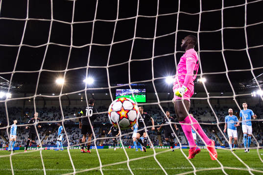 Paulo Dybala of Juventus scores a penalty behind goalkeeper