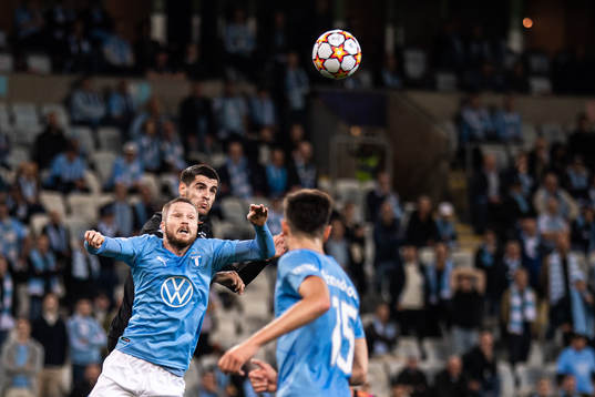 Alvaro Morata of Juventus and Lasse Nielsen of Malmö FF