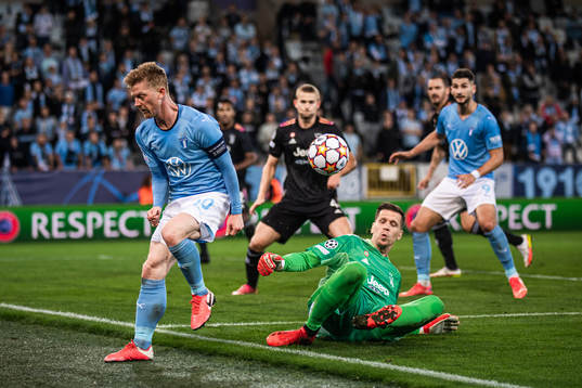 Anders Christiansen of Malmö FF and goalkeeper Wojciech