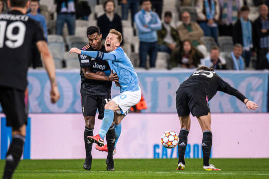 Alex Sandro of Juventus and Anders Christiansen of Malmö FF