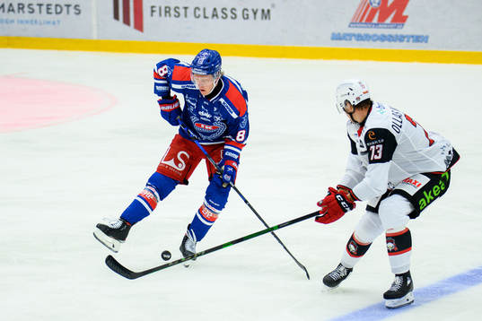 Oskarshamns Fredrik Olofsson och Malmö Redhawks Adam Ollas