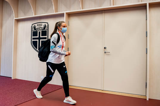 Vilde Bøe Risa of Norway arrives wearing a face mask