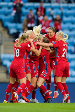 Frida Maanum and Vilde Bøe Risa of Norway celebrate the