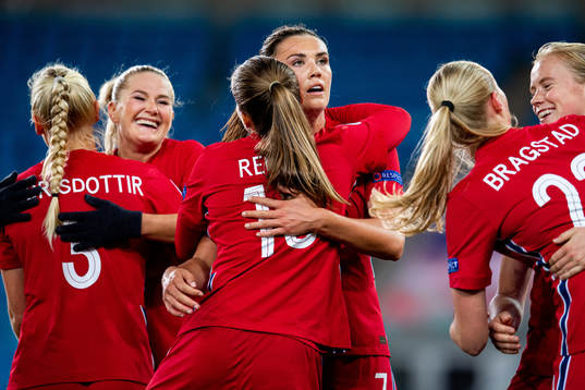 Guro Reiten and Ingrid Syrstad Engen of Norway celebrate