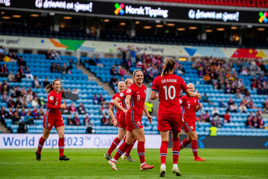 Caroline Graham Hansen of Norway celebrates with teammate