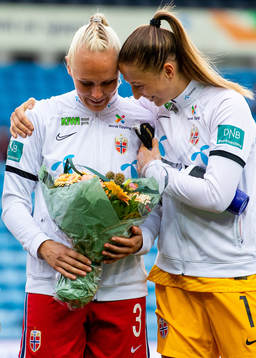 Maria Thorisdottir and goalkeeper Cecilie Fiskerstrand of