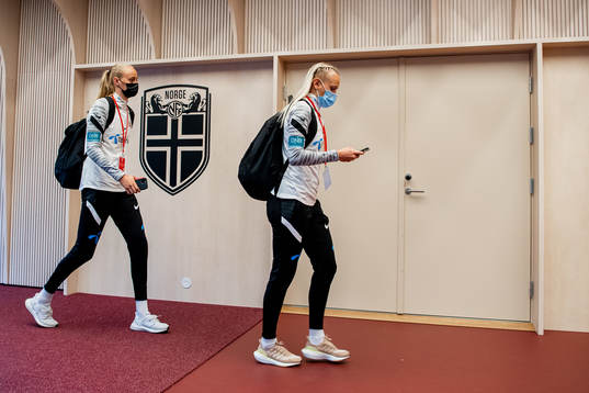 Emilie Bragstad and Karina Sævik of Norway arrive wearing