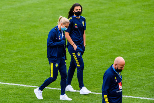 Jonna Andersson and goalkeeper Zecira Musovic of Sweden