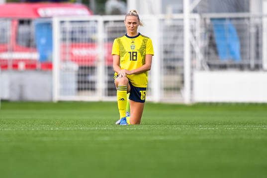 Fridolina Rolfö of Sweden kneel in support of the Black