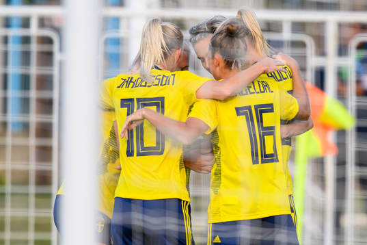 Fridolina Rolfö of Sweden celebrate with her teammates