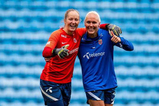 Goalkeeper Aurora Mikalsen and Maria Thorisdottir of the