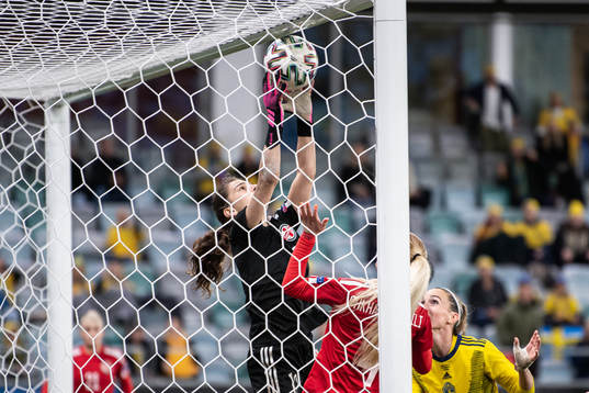 Goalkeeper Tatia abunia of Georgia with a save in front of