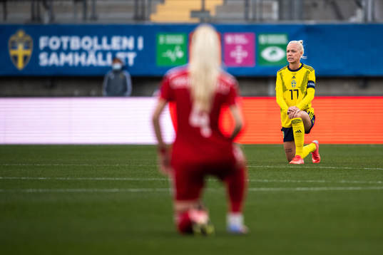Caroline Seger of Sweden kneel