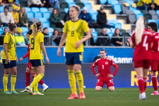 Irina Khaburdzania of Georgia looks dejected