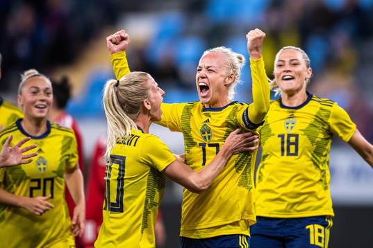 Caroline Seger of Sweden celebrate with Sofia Jakobsson and