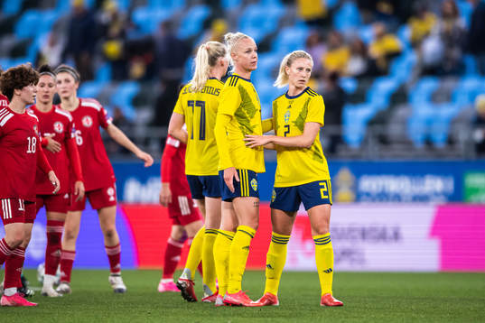 Caroline Seger and Rebecka Blomqvist of Sweden celebrate