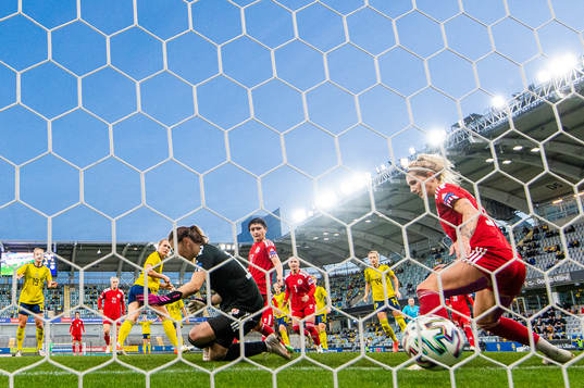 Magdalena Eriksson of Sweden scores 2-0 behind goalkeeper