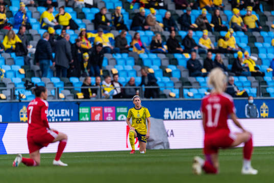Olivia Schough of Sweden takes a knee in support of the