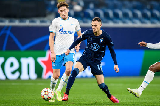 Daler Kuzyaev of Zenit and Veljko Birmancevic of Malmö FF