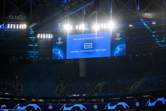 The screen showing a VAR-message of a potential red card