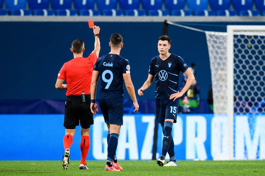 Anel Ahmedhodzic of Malmö FF is shown a red card from