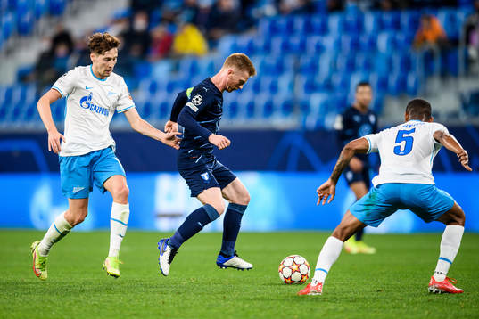 Daler Kuzyaev of Zenit against Anders Christiansen of