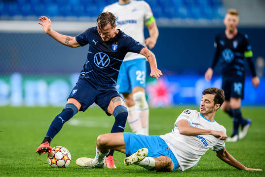 Eric Larsson of Malmö FF against Aleksander Erokhin of