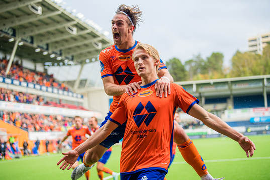 Erlend Segberg of Aalesund celebrates with Sigurd Hauso