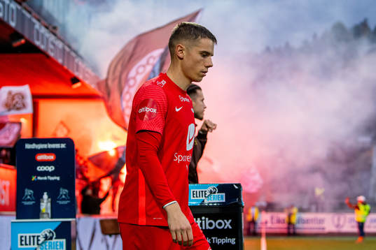 Robert Taylor of Brann enters the pitch