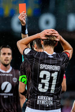 Albin Sporrong of Mjøndalen looks dejected as he receives