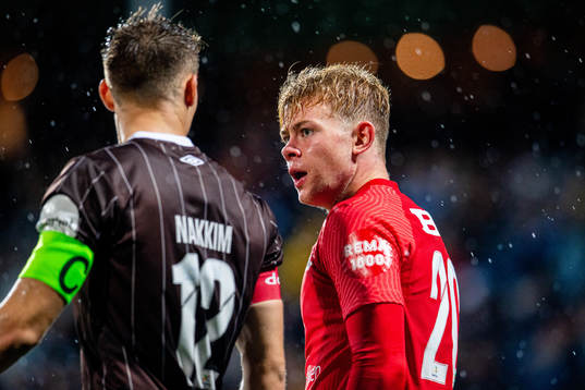 Markus Nakkim of Mjøndalen and Aune Heggebø of Brann
